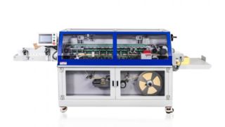 Máquina encintadora del lomo del libro